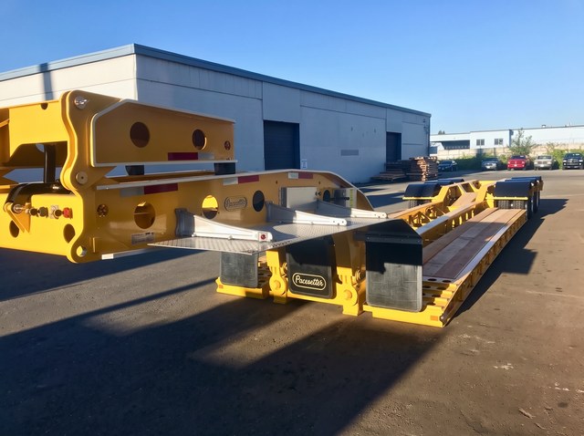 Front view of the yellow gooseneck and wooden deck.