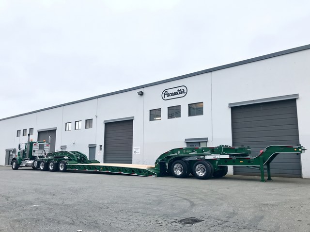 Matching green jeep and lowbed at the Pacesetter yard.