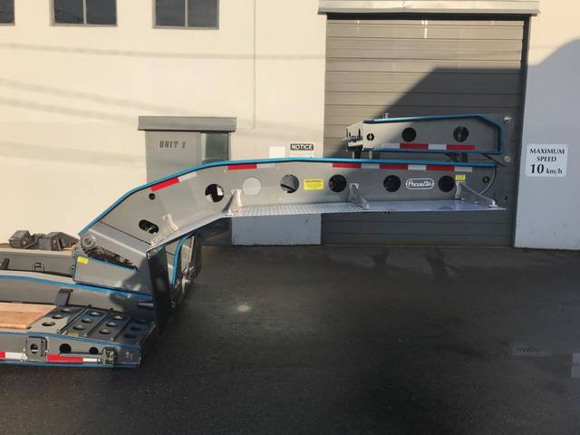 Charcoal 75 ton lowbed with light blue pinstriping and its two axle nitrogen booster, photo 4 of 26