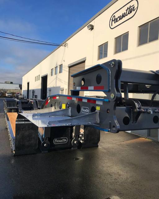 Charcoal 75 ton lowbed with light blue pinstriping and its two axle nitrogen booster, photo 22 of 26