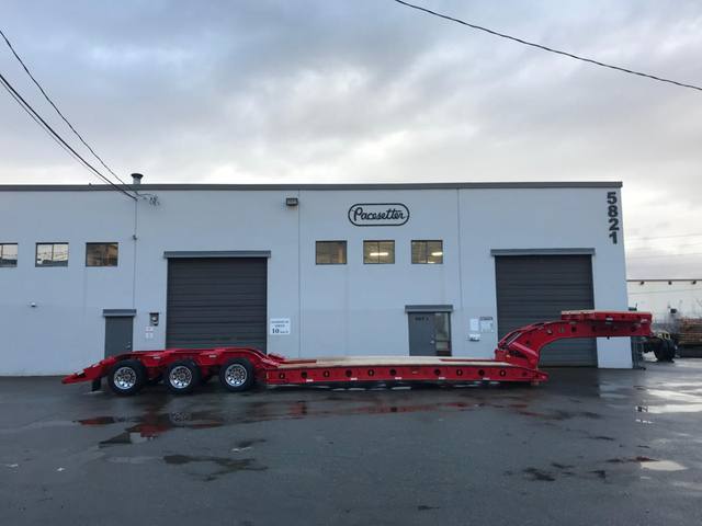 Red 75 ton lowbed with folding rear ramps at the Pacesetter yard, photo 3 of 12