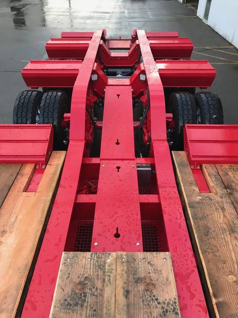 Red 75 ton lowbed with folding rear ramps at the Pacesetter yard, photo 9 of 12