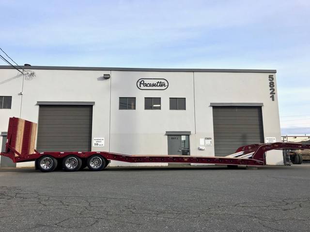 Burgundy L28 paving trailer with gold script decals on a sunny day, photo 16 of 18