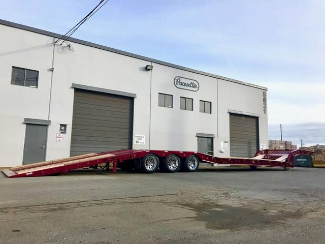 Burgundy L28 paving trailer with gold script decals on a sunny day, photo 18 of 18