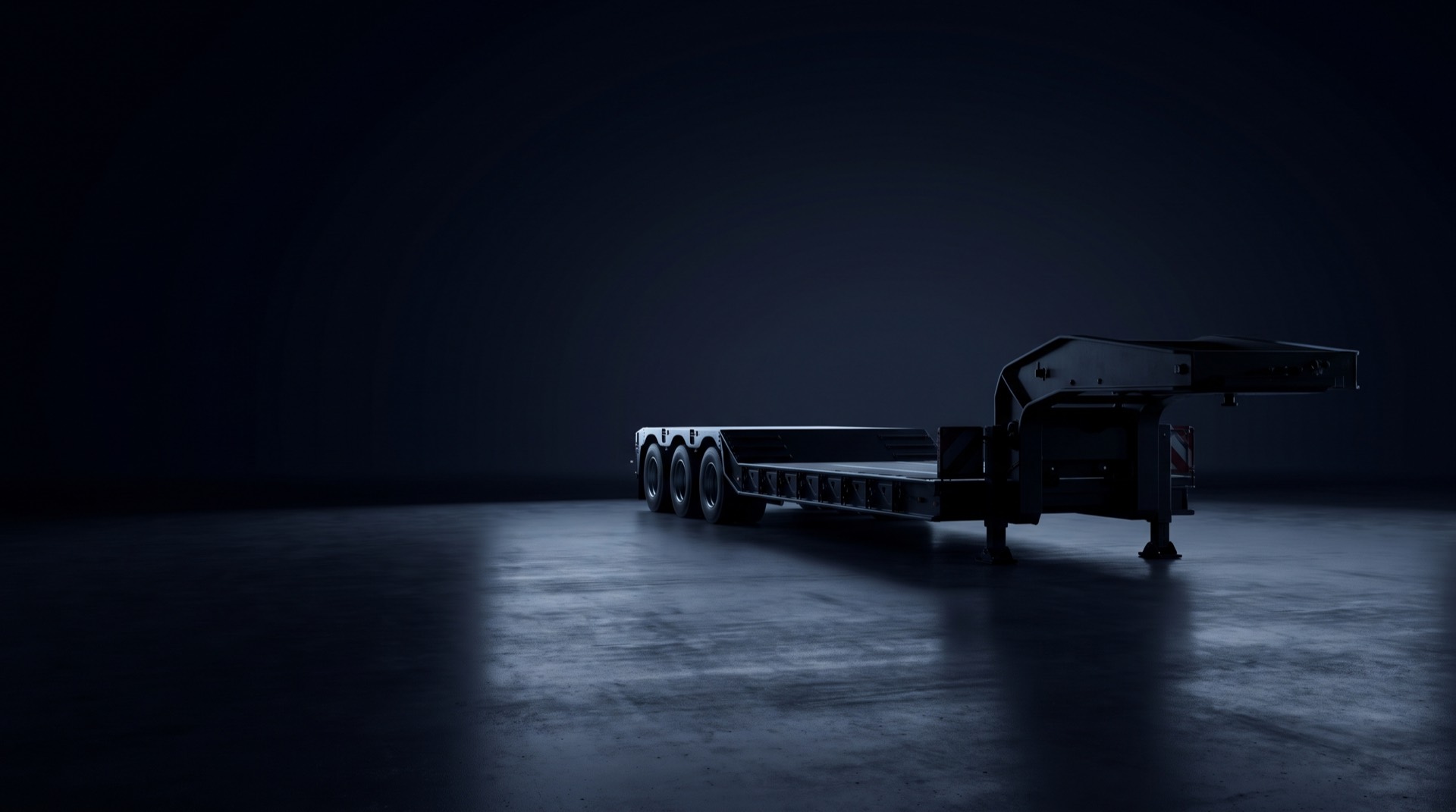 A Pacesetter lowbed trailer in silhouette, side on, lit low in a near-black navy studio: the axle group at center left, the gooseneck and jack legs at right